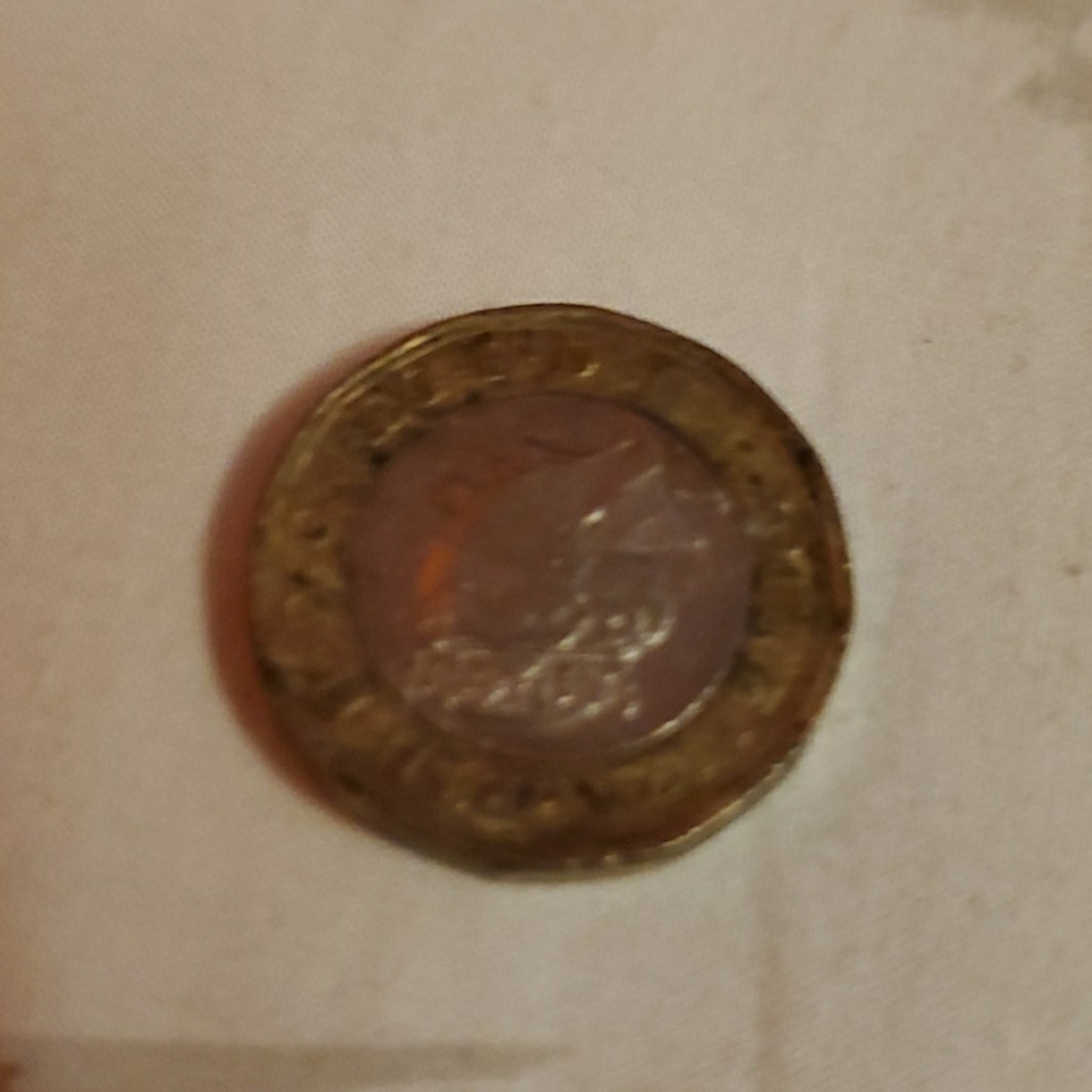 An old Spanish coin from a ship reck